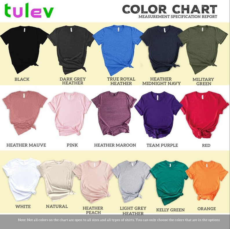 The image is a color chart that displays various t-shirt colors and their corresponding names. The chart includes a collection of t-shirts in different colors, such as black, dark grey, true royal heather, midnight navy, military green, heather mauve, pink, heather maroon, team purple, red, peach, light grey, kerry green, and orange. The chart provides a visual representation of the different color options available for t-shirt designs.
