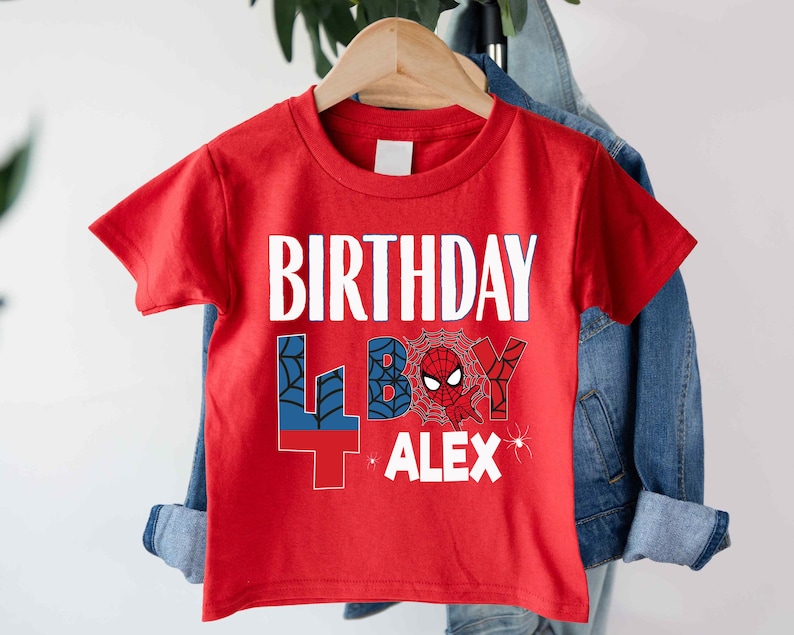 A red t-shirt with the text "BIRTHDAY 4BOY ALEX" printed on it, along with a Spider-Man character graphic.