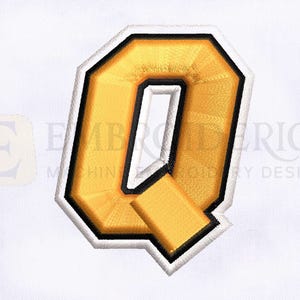 May include: Embroidered gold letter "Q" patch with black and white trim. The letter is in a bold, block style, and is set against a white background. The patch is likely for apparel or crafts.
