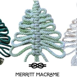 May include: Three macrame Christmas tree ornaments in shades of green and white. The trees are made of knotted rope, with a looped design and a tassel at the bottom. The brand name "Merritt Macrame" is at the bottom.