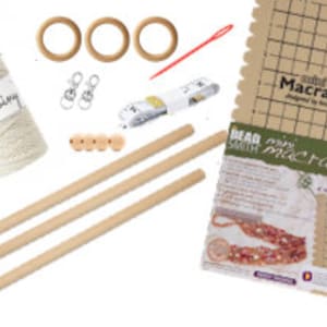 May include: Macrame kit with natural colored cord, wooden dowels, wooden rings, beads, and a macrame board with a grid pattern.