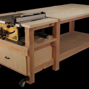May include: A wooden table saw stand with a drawer and wheels. The table saw is a yellow and black DeWalt model.