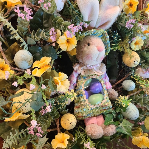 The Perfect Easter Wreath! This Wreath features an adorable Easter Bunny, Easter newest Eggs and Florals on an unusual looped Grapevine !Wreath