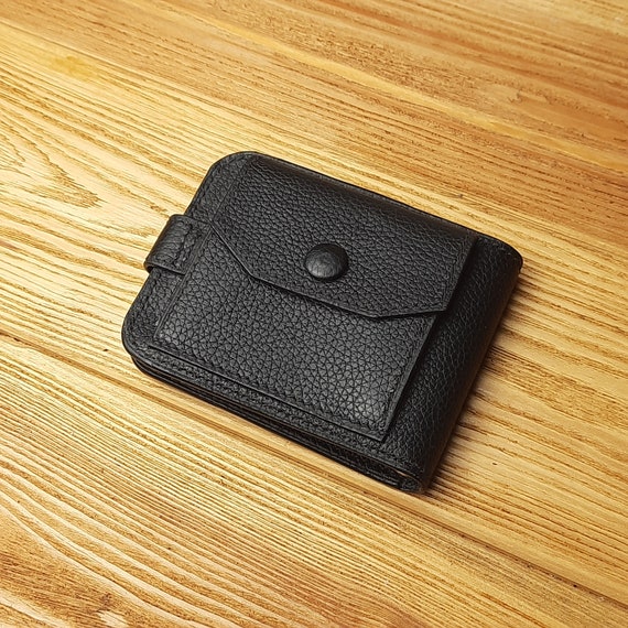 Cartera de piel negra con pinza para Pequeña y elegante