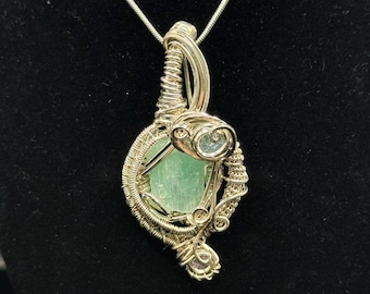 Blue tourmaline, blue topaz, and tanzanite pendant