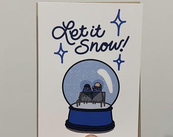 Tarjeta navideña con forma de globo de nieve