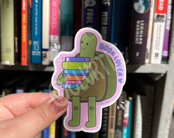 Pegatina troquelada de tortuga amante de los libros