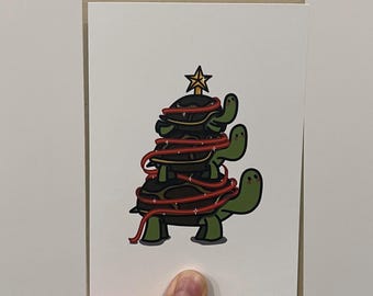 Tarjeta navideña con forma de árbol de tortuga