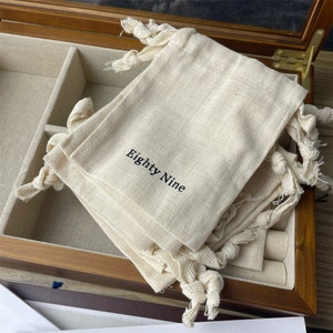 100 pièces logo personnalisé sac à cordon en coton naturel avec ruban de coton sergé, sac en coton naturel, sac d'emballage, pochette à bijoux