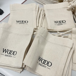100 pièces logo personnalisé sac à cordon en lin de coton naturel avec corde de coton, sac en coton naturel, sac d'emballage, pochette à bijoux