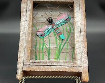 Rustic birdhouse wall hanging with dragonfly made from repurposed wood and hand painted with acrylic