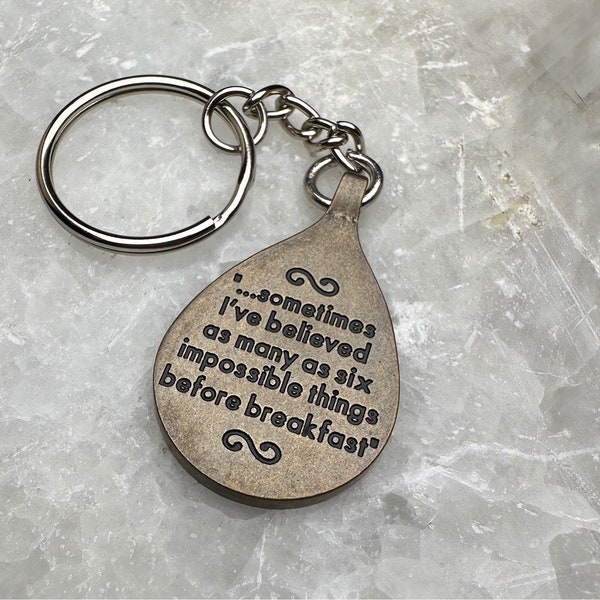Alice in Wonderland ‘Sometimes I Believe’ Embossed Quote Key Ring Keychain