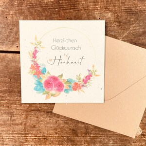 Carte de mariage avec le couronne de fleurs colorées (papier à graines)