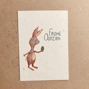 Nachhaltige Osterkarte aus Saatpapier aus handgeschöpftem Samenpapier mit Osterhase und Ei mit Blumensamen oder Möhrensamen zum Einpflanzen