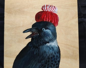 Jackdaw in a red beanie acrylic painting on woodboard