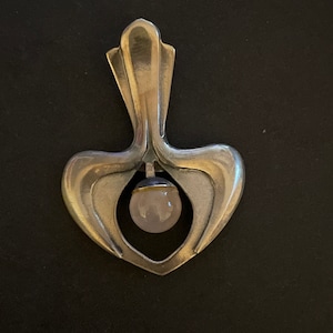 Hand made silver pendant with rose Quartz