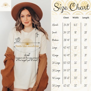 May include: A cream-colored t-shirt with the text "Feels like sunshine" and a golden sunburst design. The image includes a size chart with chest, width, and length measurements in inches for various sizes, from XSmall to 5XLarge.