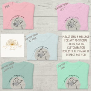 May include: A collection of t-shirts in various colors, including pink, lilac, ice blue, dusty blue, and mint. Each shirt features a dog graphic with the text "I'm it dogs love all find permanent homes."