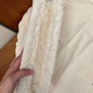 May include: A rustic wooden sign with the text "Welcome to our home" in white lettering. The sign features a distressed finish and a simple, inviting design, perfect for a front porch or entryway.