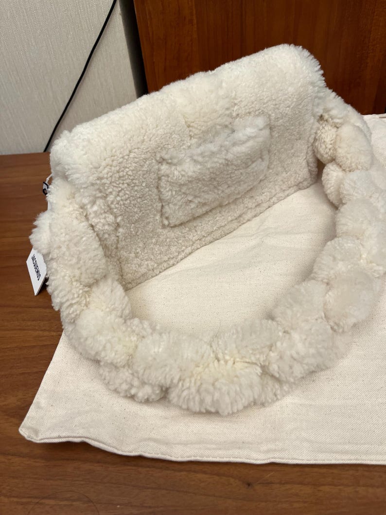 May include: A handmade wooden sign with the text "Welcome" in a playful font. The sign features a distressed white background and a dark brown border, perfect for a front door or entryway. The sign measures approximately 12 inches wide and 6 inches tall.