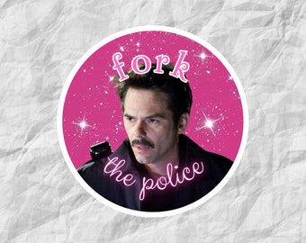 May include: A pink circle sticker with a white border. The sticker features a man with a mustache and a serious expression. The text "fork the police" is written in pink neon letters on the sticker.