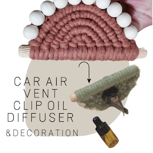 May include: A handmade macrame car air vent diffuser with a wooden dowel and white beads. The diffuser is attached to a green car vent clip. A small amber glass bottle of essential oil is also shown.  CAR AIR VENT CLIP OIL DIFFUSER & DECORATION