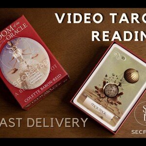 May include: A red box with the text "Wisdom of the Oracle Invitation Cards" and "Secretbd A Blessing Tarot Colette Baron-Reid" on the front. The box is open and shows a card with a clock and a hot air balloon. The text "Tick-Tock" is on the card. The text "Video Tarot Reading" is in large white letters at the top of the image. The text "Fast Delivery" is in large white letters at the bottom of the image.