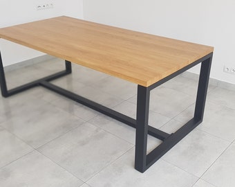 Oak dining table with metal legs