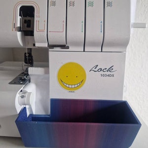 Tråduppsamlare/uppsamlingsbehållare för Brother overlockmaskin 1034DX bild 4