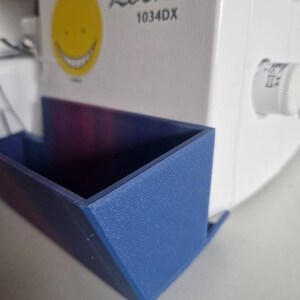 Tråduppsamlare/uppsamlingsbehållare för Brother overlockmaskin 1034DX bild 5