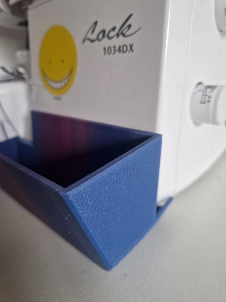 Tråduppsamlare/uppsamlingsbehållare för Brother overlockmaskin 1034DX bild 5