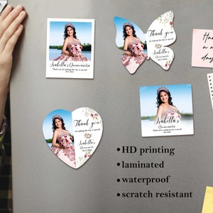 May include: Set of four personalized quincea&ntilde;era magnets featuring a young woman in a pink dress. The magnets are in the shapes of a square, rectangle, butterfly, and heart. The text on the magnets reads "Isabella's Quinceanera" and "Thank you for making this day so special".