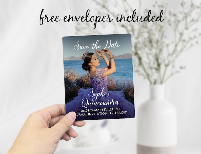 May include: Save the Date card for a Quincea&ntilde;era with a photo of a young woman in a purple dress and crown. The card says "Sophis Quincea&ntilde;era" and includes the date "06.28.24 MARYSVILLE,OH" and the text "ORMAL INVITATION TO FOLLOW".