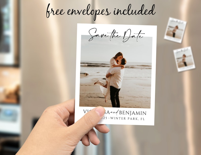 May include: Save the Date card featuring a photograph of a couple on a beach. The card is white with black text and a black border. The text reads "Save the Date" in cursive and "Victoria and Benjamin" in a sans-serif font. The date is "10.25" and the location is "Winter Park, FL".