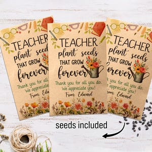 May include: Three brown paper seed packets with a watercolor design of flowers and a watering can. The text on the packets reads "Teacher plant seeds that grow forever."  The packets include a thank you message and a space to write a name.  The text "seeds included" is written below the packets.