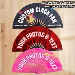 May include: Three folding hand fans displayed in a vertical row. The top fan features a galaxy print with the text CUSTOM CLACK FAN. The middle fan is red with the text YOUR PHOTOS & TEXT. The bottom fan is pink with the text YOUR PHOTOS & TEXT.