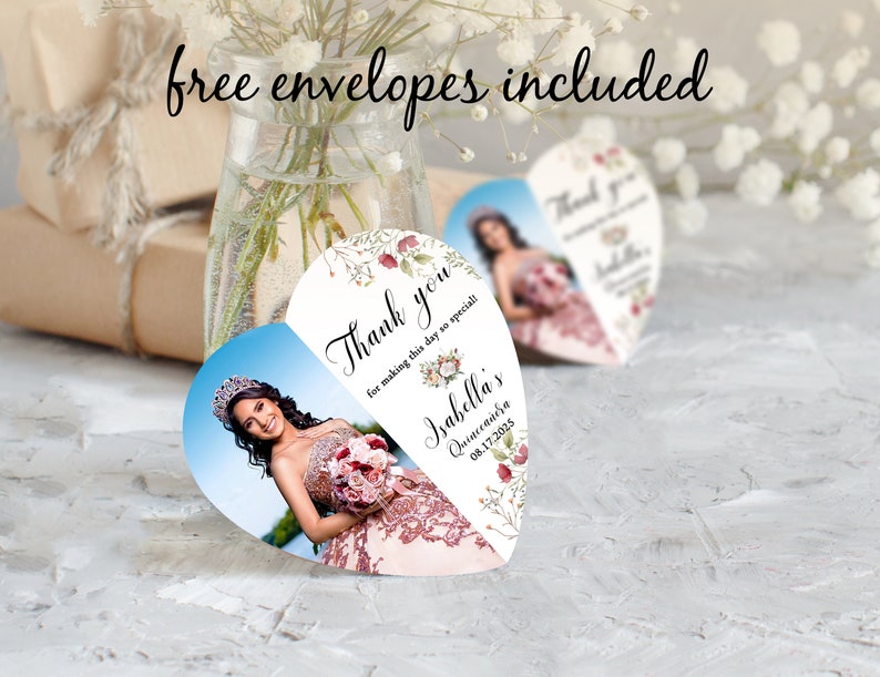 May include: Heart-shaped thank you card with a floral design and a photo of a young woman in a quincea&ntilde;era dress. The card says "Thank you for making this day so special" and "Isabella's Quincea&ntilde;era 08.17.2025".