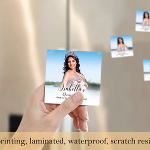 May include: A square magnet with a photo of a young woman in a quincea&ntilde;era dress. The magnet has the text "Isabella's Quince" and "Thank you for celebrating with us!" printed on it.