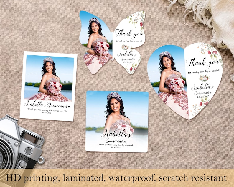 May include: Four different designs of thank you cards for a Quincea&ntilde;era. Each card features a photo of a young woman in a quincea&ntilde;era dress and the text "Isabella's Quincea&ntilde;era" with the date "08.17.2025". The cards are in the shapes of a square, a butterfly, a heart, and a rectangle.