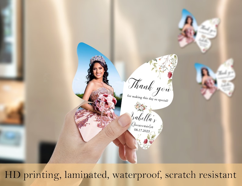 May include: Butterfly-shaped thank you cards with a floral design and a photo of a person in a quincea&ntilde;era dress. The text on the card reads "Thank you for making this day so special!" and "Isabella's Quinceanera 08.17.2025".