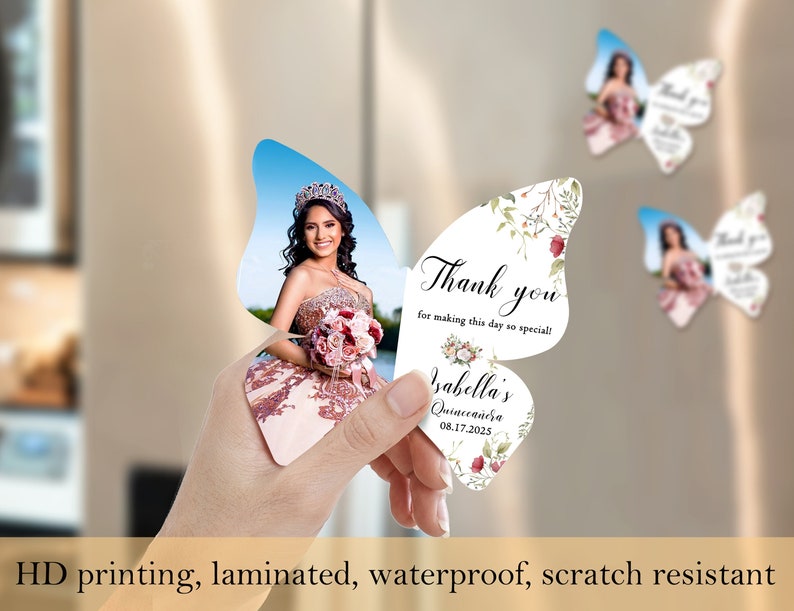 May include: Butterfly-shaped thank you cards with a floral design and a photo of a young woman in a quincea&ntilde;era dress. The text on the card reads "Thank you for making this day so special!" and "Isabella's Quinceanera 08.17.2025".