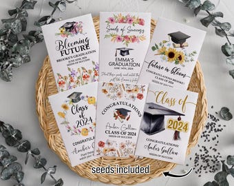 May include: A set of ten graduation seed packets with watercolor floral designs. Each packet features a graduation cap and the text "Class of 2024". The packets are labeled with different names and messages, such as "Blooming Future", "Seeds of Success", and "Future in Bloom".