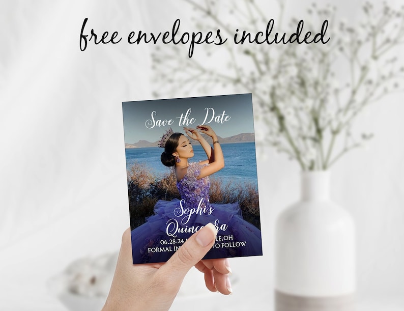 May include: Save the Date card for a Quincea&ntilde;era with a photo of a young woman in a purple dress. The card has a blue background with a photo of a lake and mountains in the background. The text on the card reads "Save the Date", "Sophis Quincea&ntilde;era", "06.28.24", "Formal Invitations to Follow".