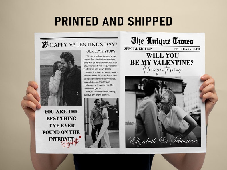 May include: A personalized newspaper-style print with black text and black and white photos. The headline reads "Happy Valentine's Day!" and "Will You Be My Valentine?" with a couple's names. The print is held by a person.