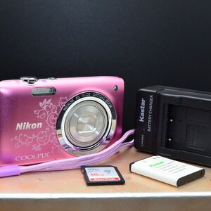 Nikon CoolPix S2700 16MP Digital Camera. Includes new battery, charger and a 16GB SD memory card. Fully tested and working. See notes.