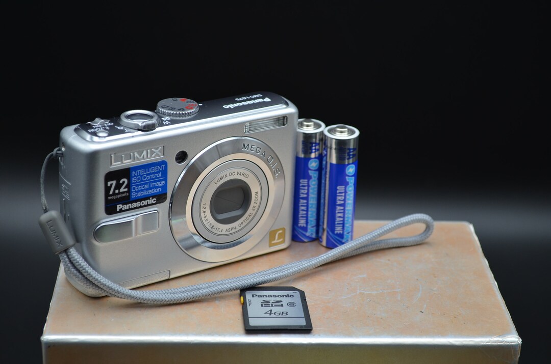 Panasonic Lumix DMCLS75 7MP Compact Digital Camera. Batteries and a