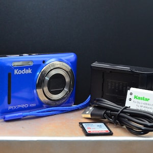 Like new Blue Kodak Pixpro FZ53 16MP digital camera. Included are a new battery, new charger, and a 8GB SD card. Fully tested and working,