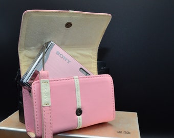 Lightly used Pink Sony Cybershot leather case and wrist strap. Case only. Camera not included.