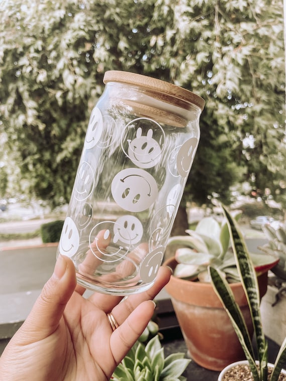 Smiley face glass can
