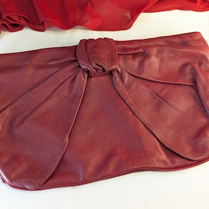 Arnold Churgin Designer Leather Hand Bag Red Leather Clutch Bow Motif Soft Red Accessory Purse Zippered Purse